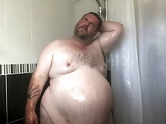 Chubby 550lbs guy enjoying a shower