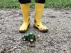 Worker Stomping Toy Tractor