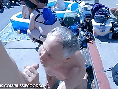 Exhibitionist dad enjoys public piss play and raw pounding at Folsom Street Fair