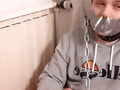 Bound and Smoking Hunk in Gay BDSM Action