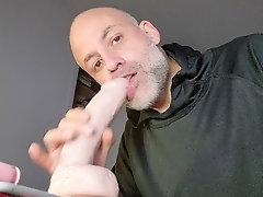 Amateur deepthroat expert devours juicy rubber cock, savoring every drop of precum